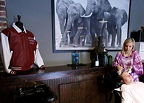 Woman Shampooing a Customer